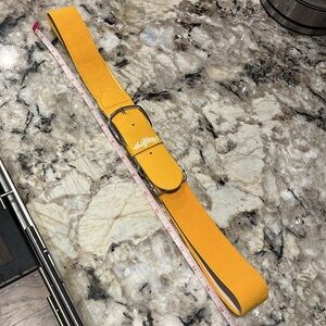 Golden yellow Rawlings adjustable softball/baseball belt